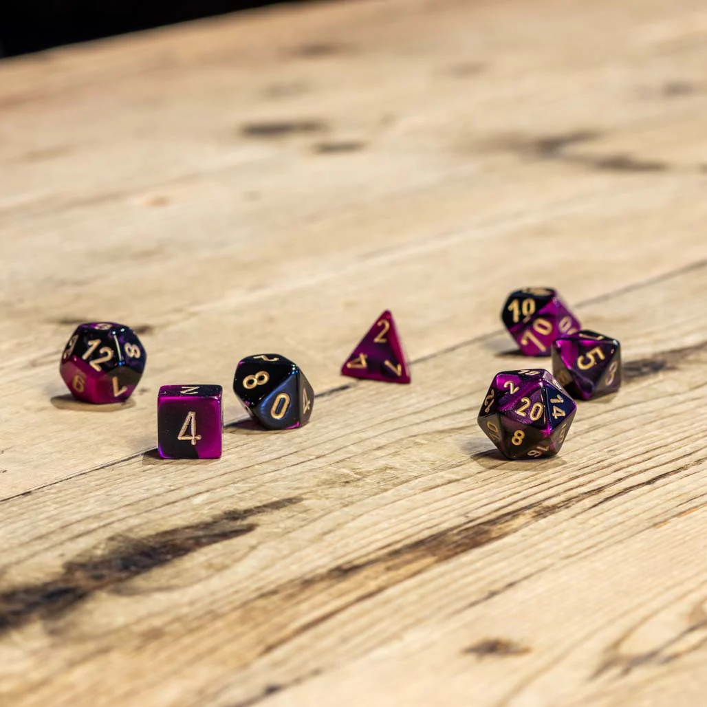 Chessex #26440 - Gemini Black-Purple / Gold Polyhedral (7ct)